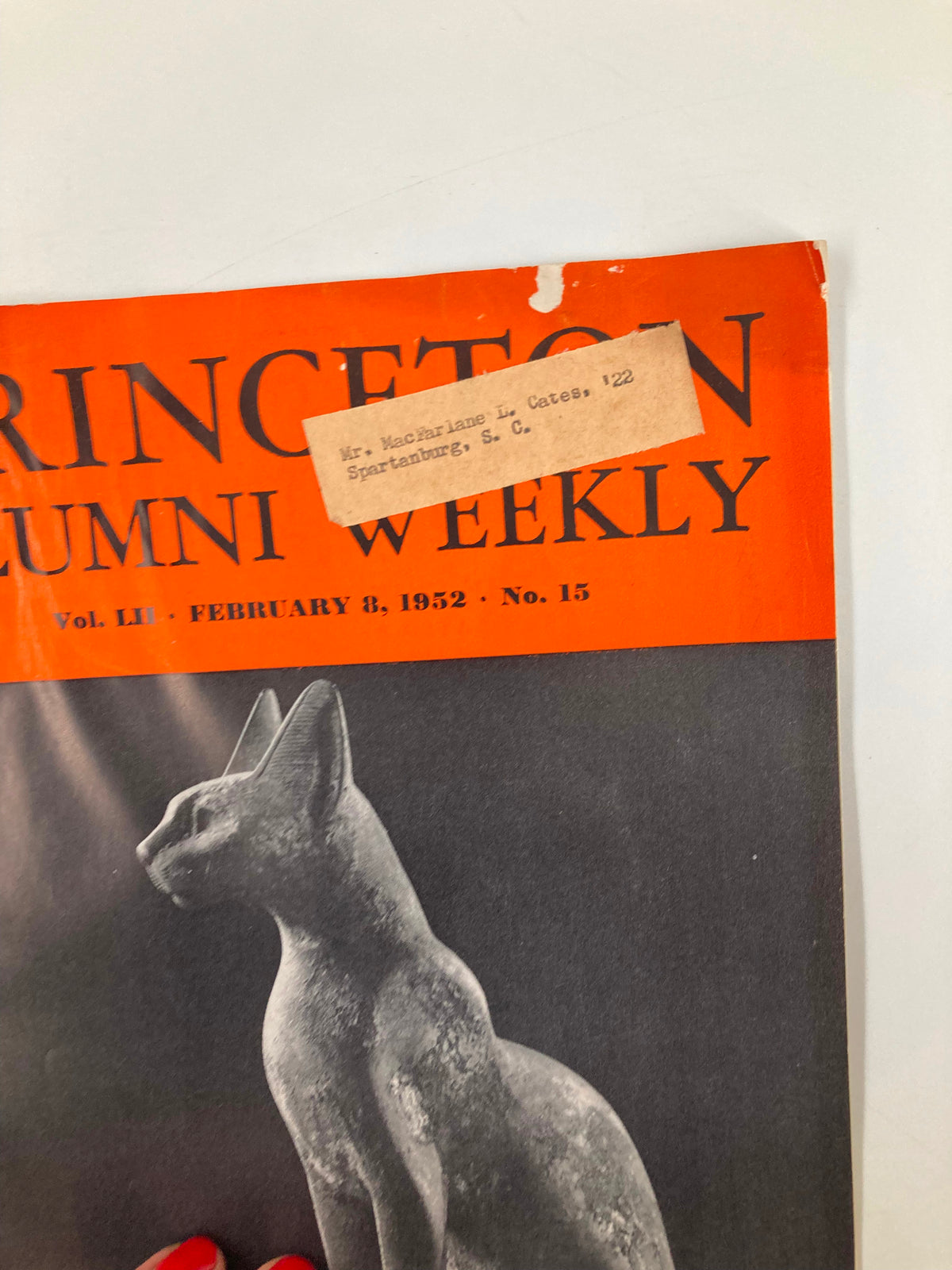 Close-up of the cover of VTG Princeton Alumni Weekly February 8, 1952, emphasizing the cat sculpture and the orange header with publication details.