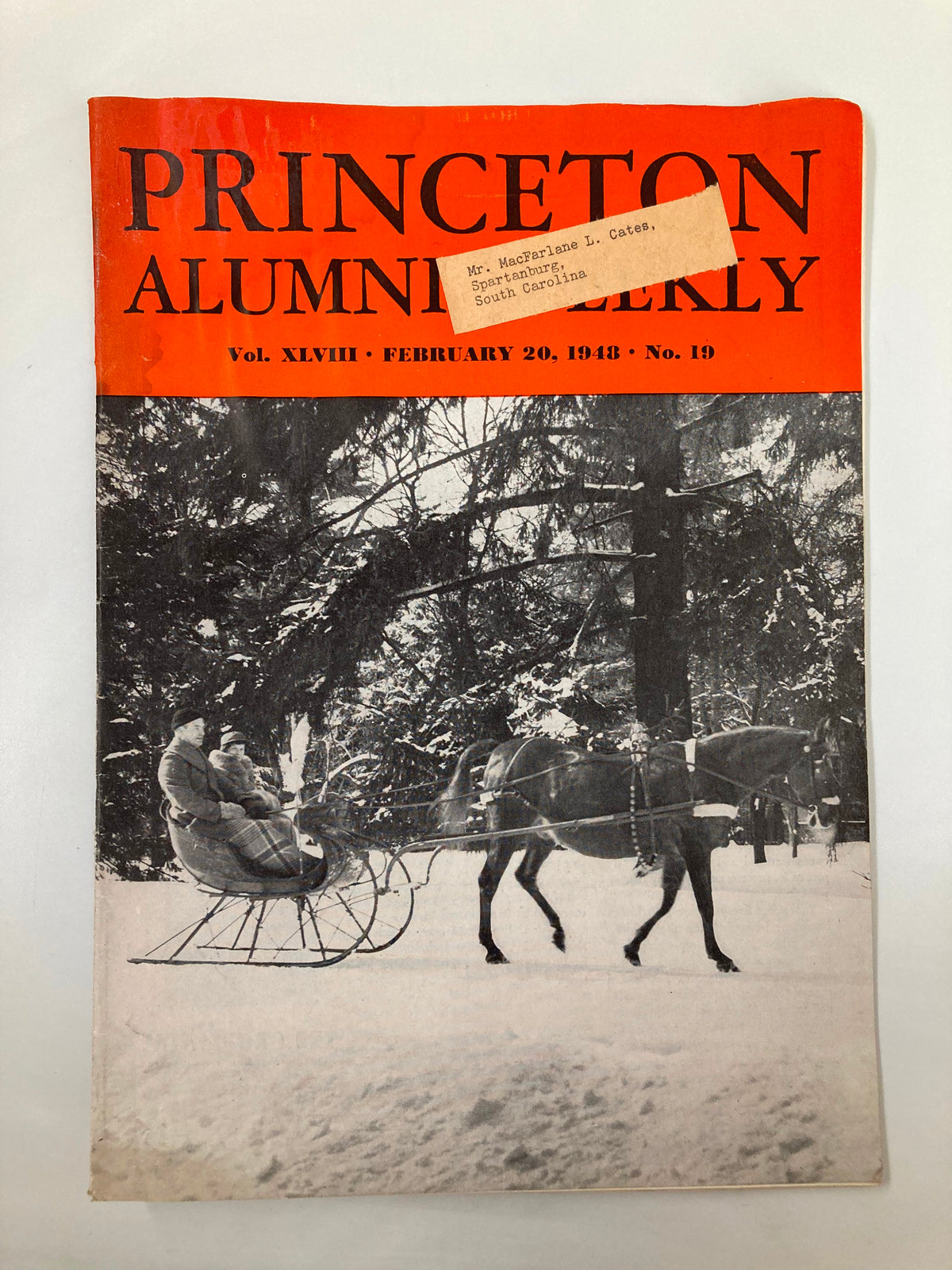 Cover of VTG Princeton Alumni Weekly February 20, 1948, featuring a black and white image of an old-fashioned sleigh ride in the snow, showcasing nostalgic winter scenes.