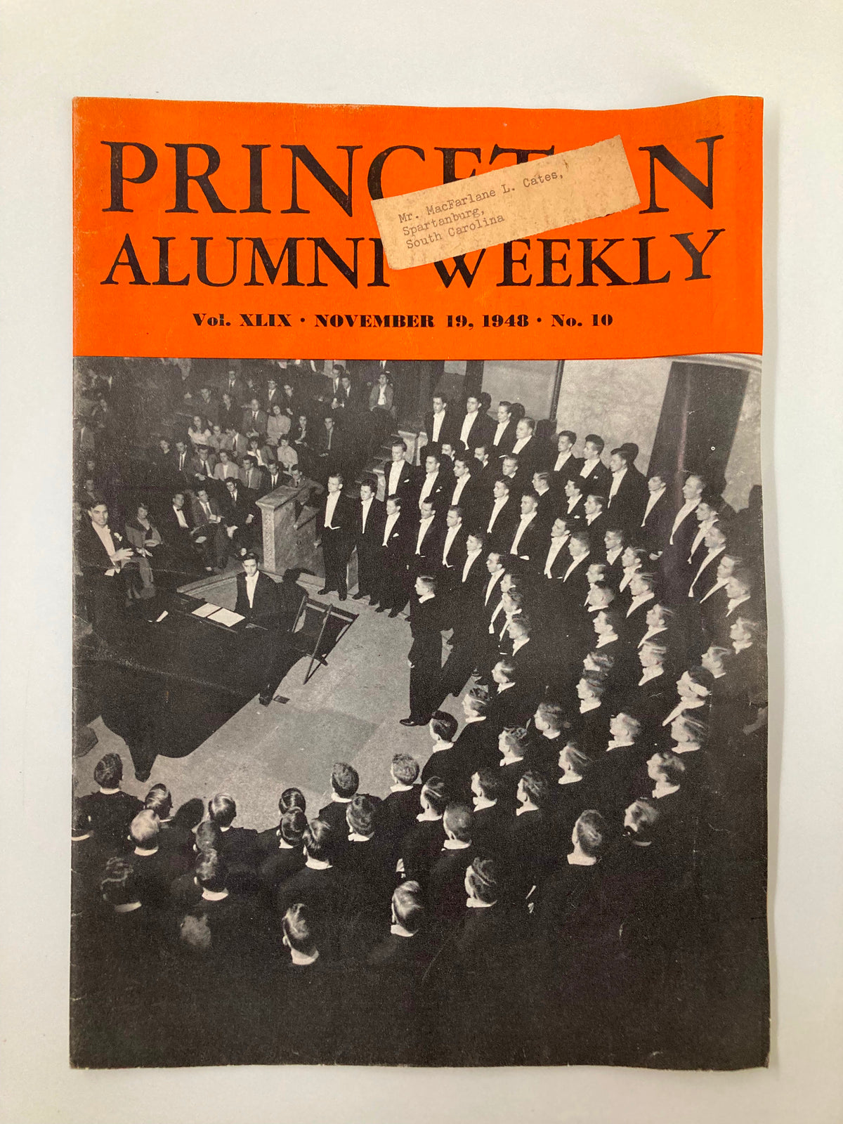 Cover of VTG Princeton Alumni Weekly from November 19, 1948, featuring The Princeton Glee Club debut. The magazine displays a black-and-white photograph of a choir performance with an orange header.