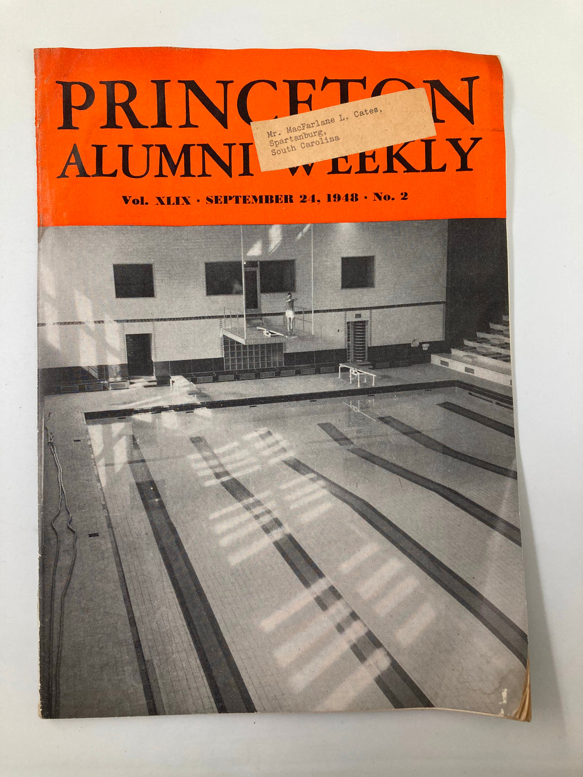 Cover of VTG Princeton Alumni Weekly September 24 1948 featuring an image of the Dillon Gymnasium Swimming Pool with a label addressed to Mr. Macfarlane L. Cates from Spartanburg, South Carolina.