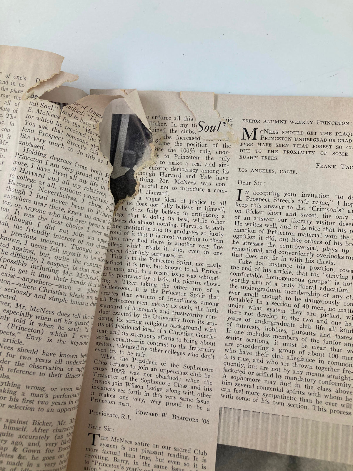 Close-up view of a torn interior page from the VTG Princeton Alumni Weekly March 13, 1959, highlighting text on the alumni community and club system discussions.