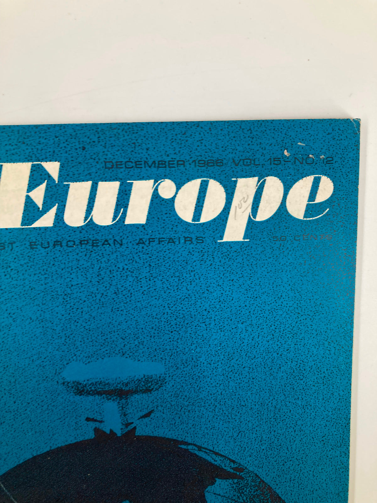 Cover of VTG East Europe Magazine December 1966 showcasing a blue design with a depiction of a missile and a globe, relevant to the article on Moscow and the Chinese Missile.