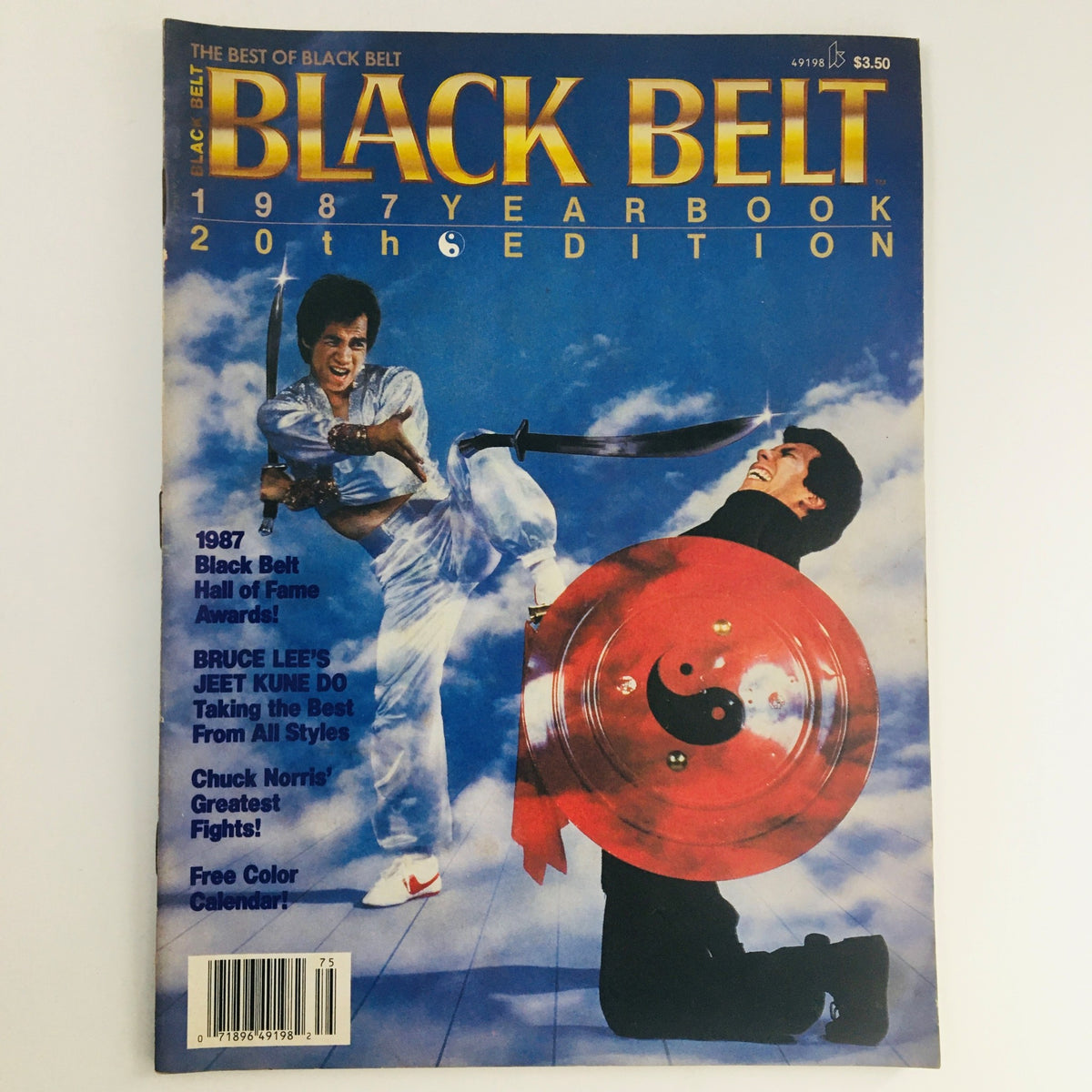 Cover of the Black Belt Yearbook 1987 Vol 25 featuring martial artists in action, showcasing a thrilling moment with a sword and shield, and details about the yearbook's 20th edition.