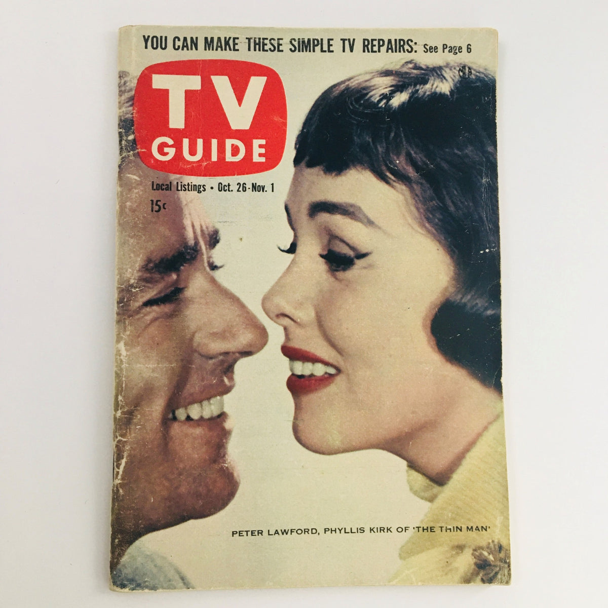 TV Guide Magazine October 26 1957 featuring Peter Lawford and Phyllis Kirk on the cover. Iconic vintage magazine showcasing television history from the late 1950s.