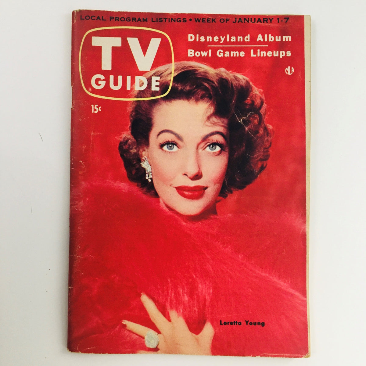 TV Guide Magazine January 1 1955 Vol 3 #1 featuring American actress Loretta Young on the cover, showcasing a vibrant design with red background and bold text.