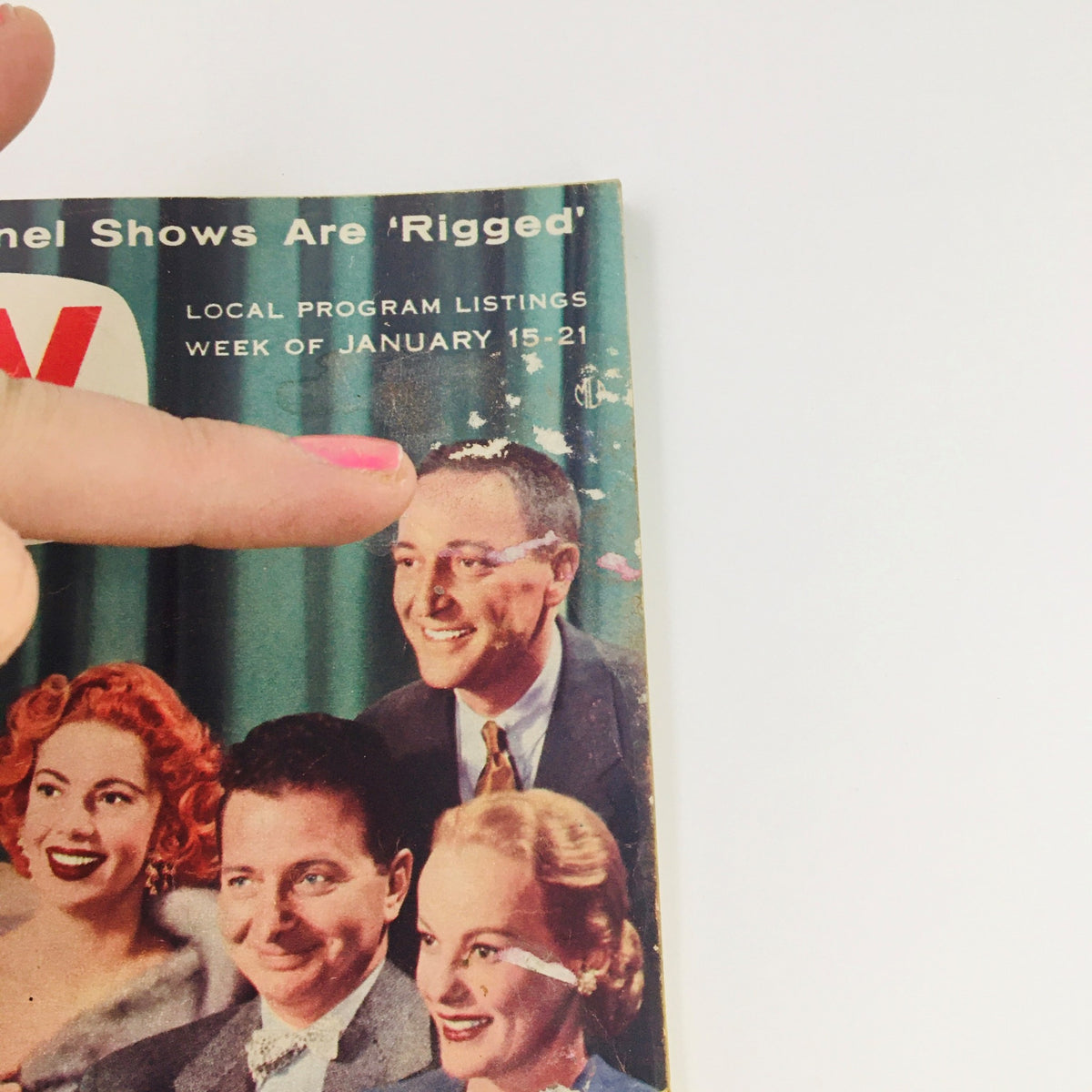 Close-up of the TV Guide Magazine January 15, 1955, Vol 3 #3 cover, featuring a pointing finger indicating the topics 'Why Panel Shows Are 'Rigged' and local program listings.