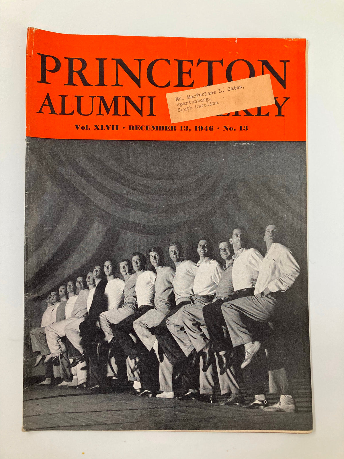 Front cover of the VTG Princeton Alumni Weekly dated December 13, 1946, featuring a group of men posed in a dance formation. The magazine is titled 'Princeton Alumni Weekly' with an orange background and includes the subtitle 'Vol. XLVII - December 13, 1946 - No. 13'.