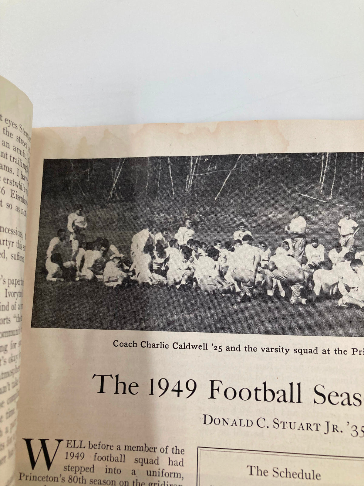 Team meeting of Coach Charlie Cadwell '25 with the Princeton varsity football squad in the 1949 Princeton Alumni Weekly.