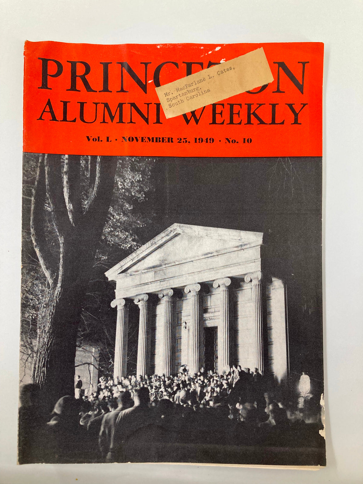Cover of Princeton Alumni Weekly dated November 25, 1949, featuring a historic black and white image of the Cannon Green site victory bonfire and a crowd celebrating.