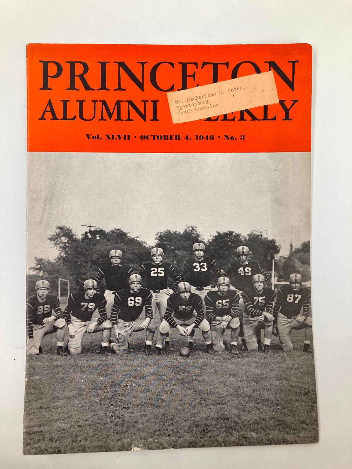 Cover of the VTG Princeton Alumni Weekly from October 4, 1946, celebrating D'Olier's Medal of Merit with a vintage football team photo.
