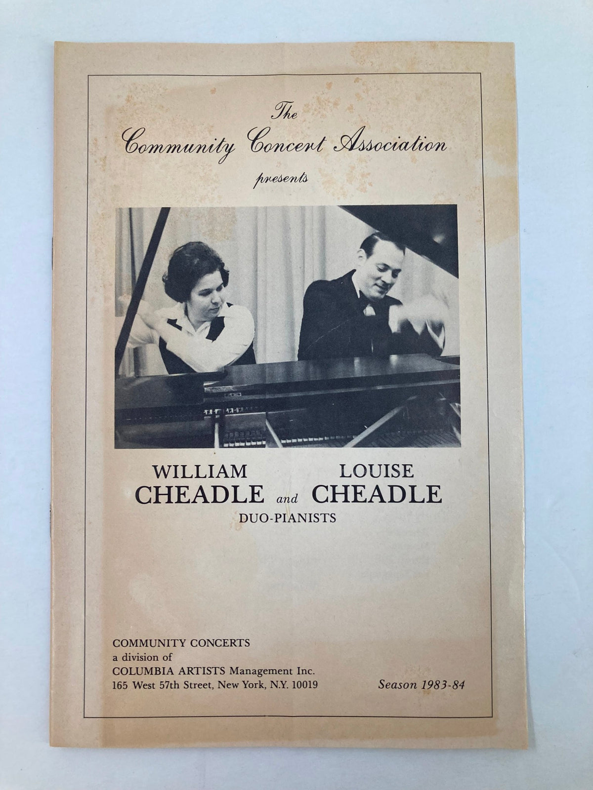 1983 Program Community Concert Association featuring William Cheadle and Louise Cheadle, duo-pianists. The cover includes a photograph of the duo performing at the piano.