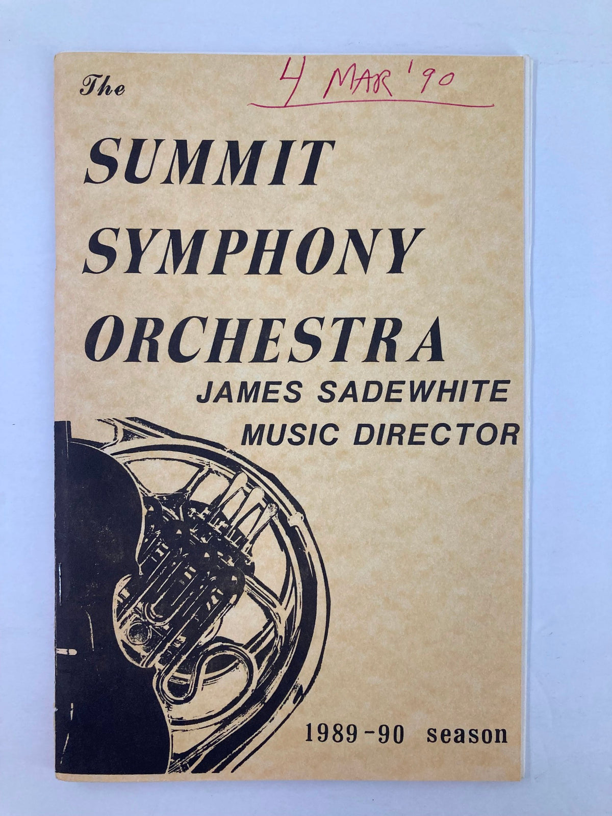 1990 Program The Summit Symphony Orchestra featuring James Sadewhite as Music Director, showcasing the front cover design with a French horn illustration.