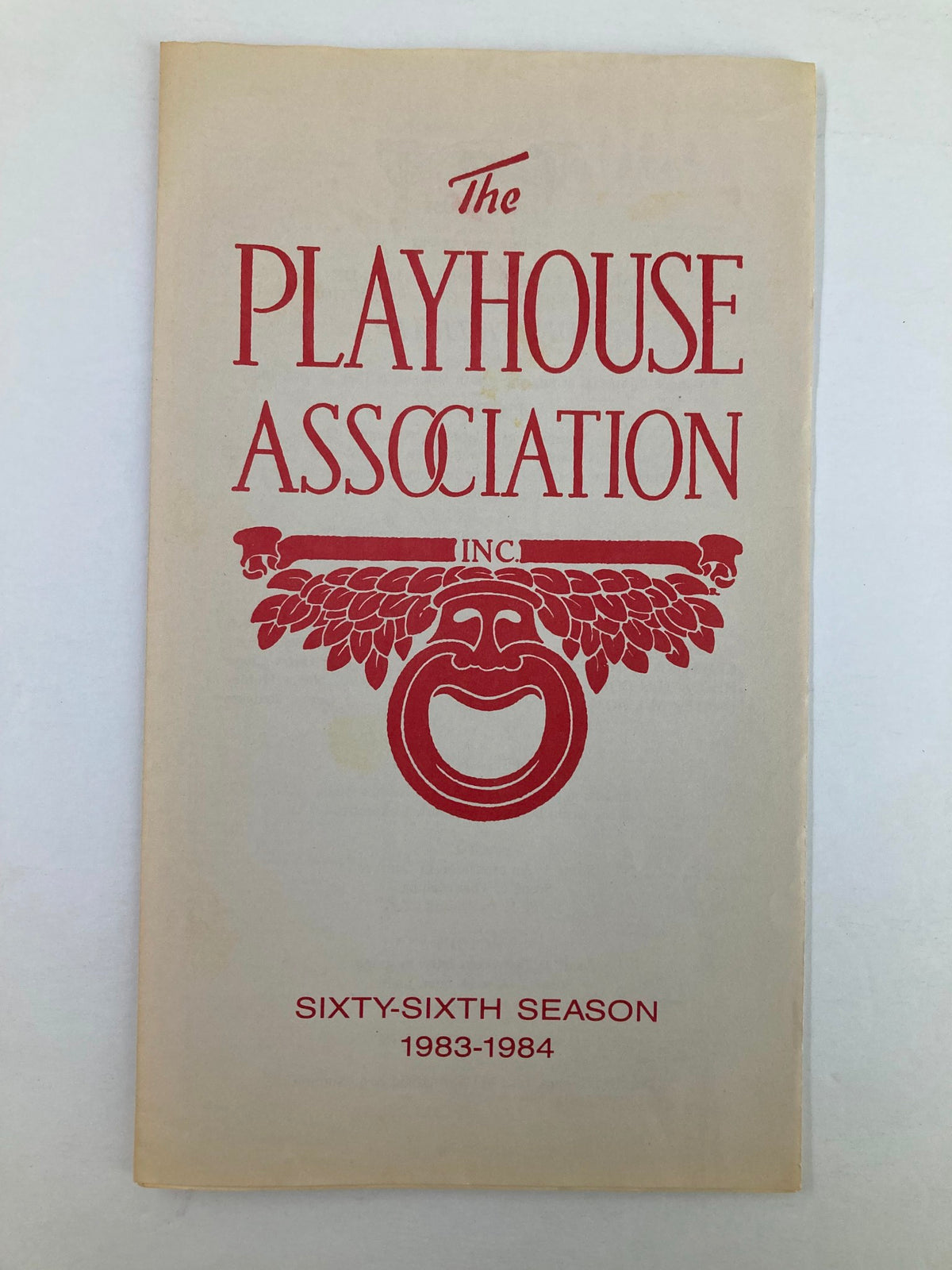 Front cover of the 1983 program for 'Deathtrap' by Ira Levin, presented by The Playhouse Association, featuring a red design and the title prominently displayed.