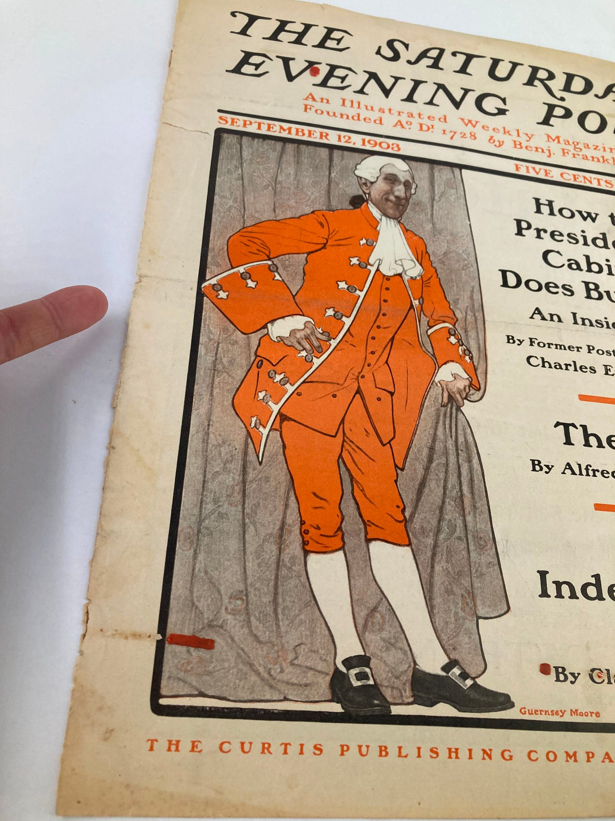 Cover of The Saturday Evening Post from September 12, 1903 featuring a vibrant illustration of a gentleman in an orange suit, part of a historical vintage magazine collection.