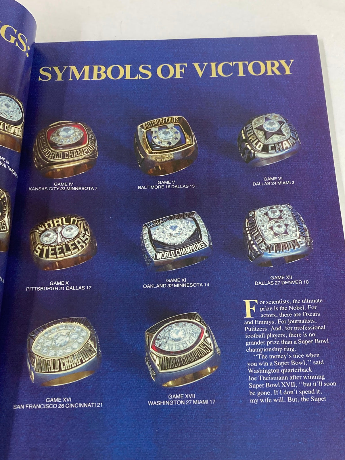 1984 NFL Super Bowl XVIII Magazine displaying Super Bowl championship rings, emphasizing their symbolism of victory and importance in American football culture.
