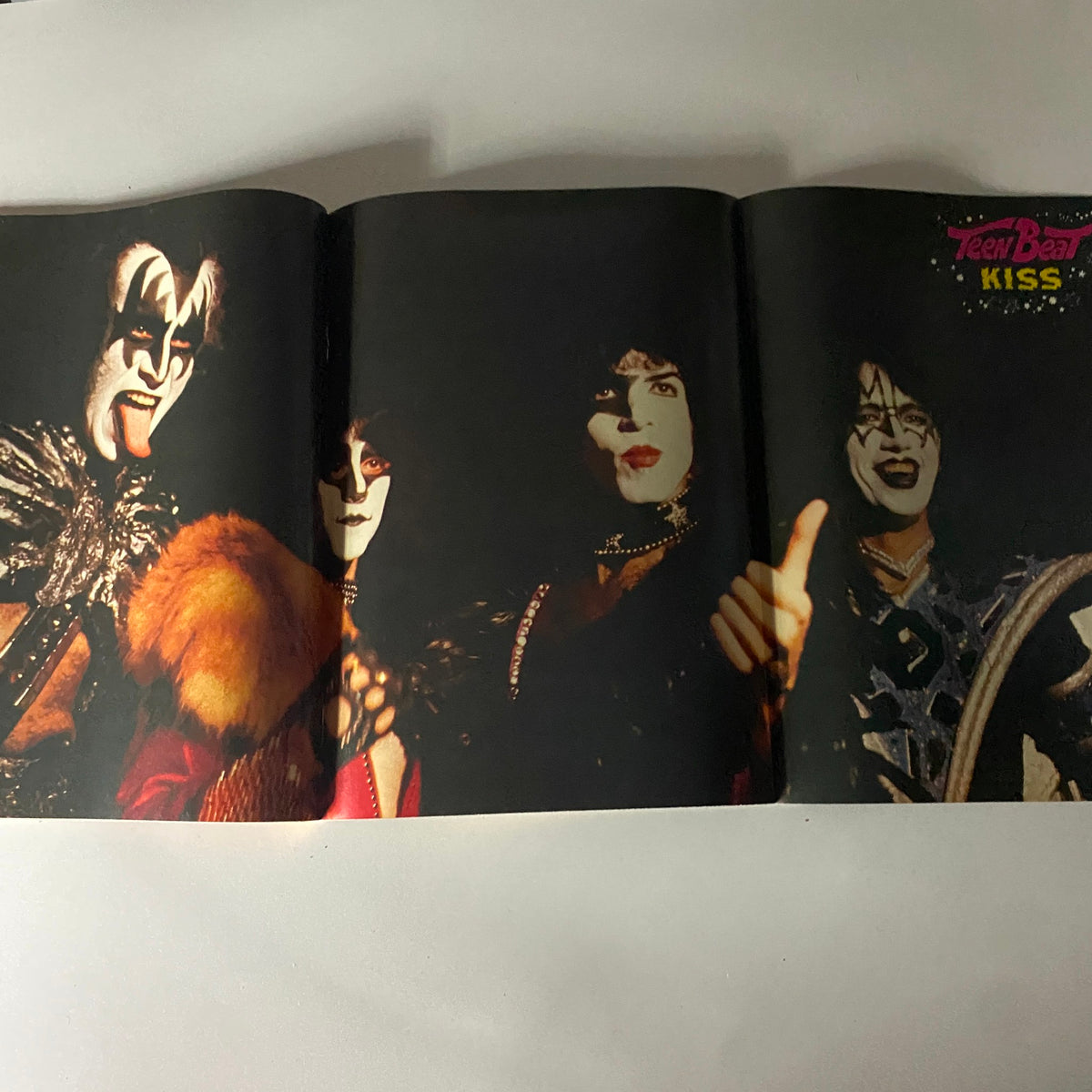 Full-color pull-out centerfold of the band Kiss featured in Teen Beat Magazine January 1981, showcasing their iconic stage presence.