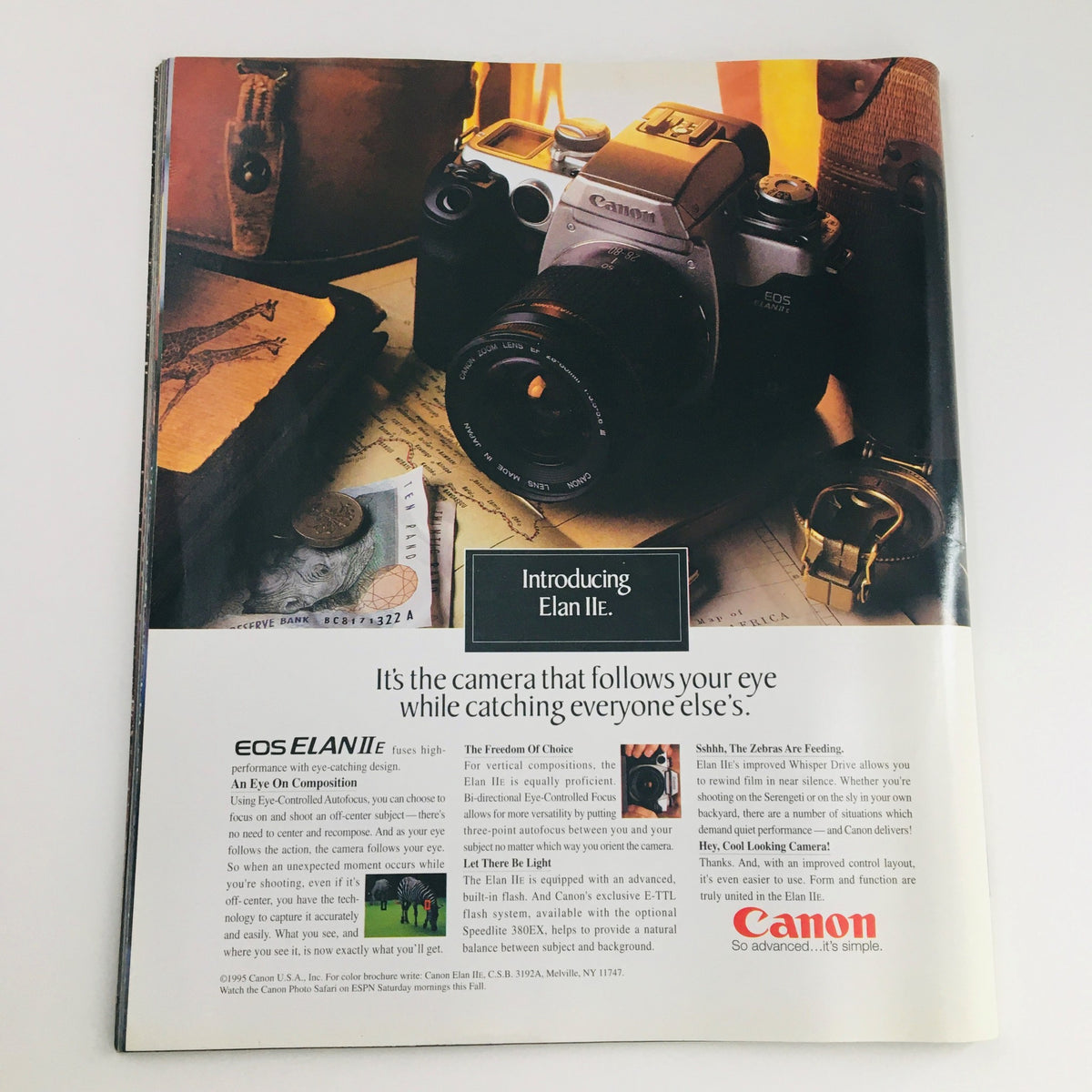 Advertisement page from Sports Illustrated Magazine 1995 introducing the Canon EOS Elan II camera, highlighting its features and design.