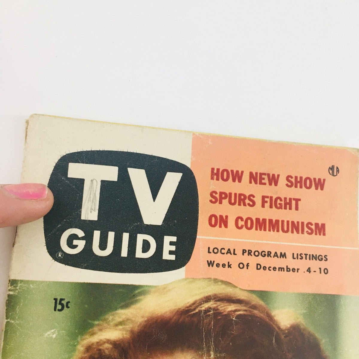 Side view of TV Guide Magazine December 4, 1953 cover featuring Loretta Young, showcasing the magazine's title and main headline.