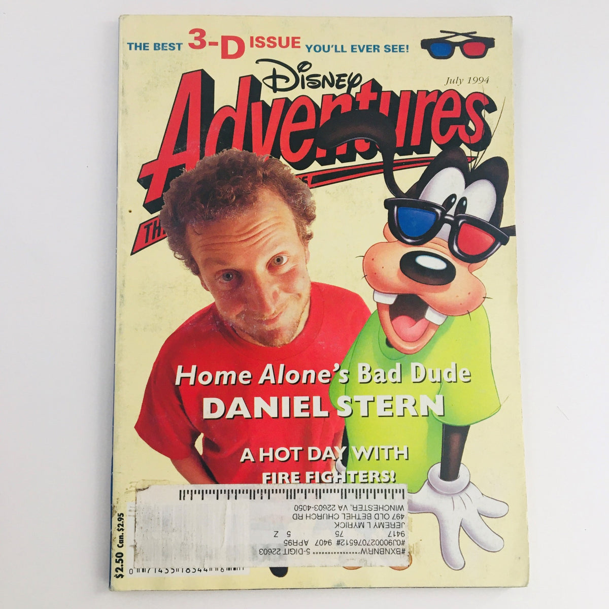 Cover of Disney Adventures Magazine July 1994 featuring Home Alone's Bad Dude Daniel Stern and a cartoon character Goofy wearing red glasses.