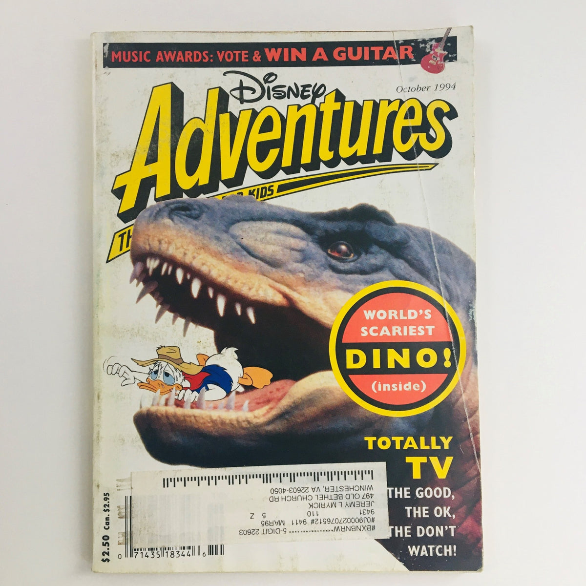 Cover of Disney Adventures The Magazine, October 1994 issue featuring the title and illustration of a dinosaur with a tagline 'World's Scariest DINO!' alongside iconic Disney characters.