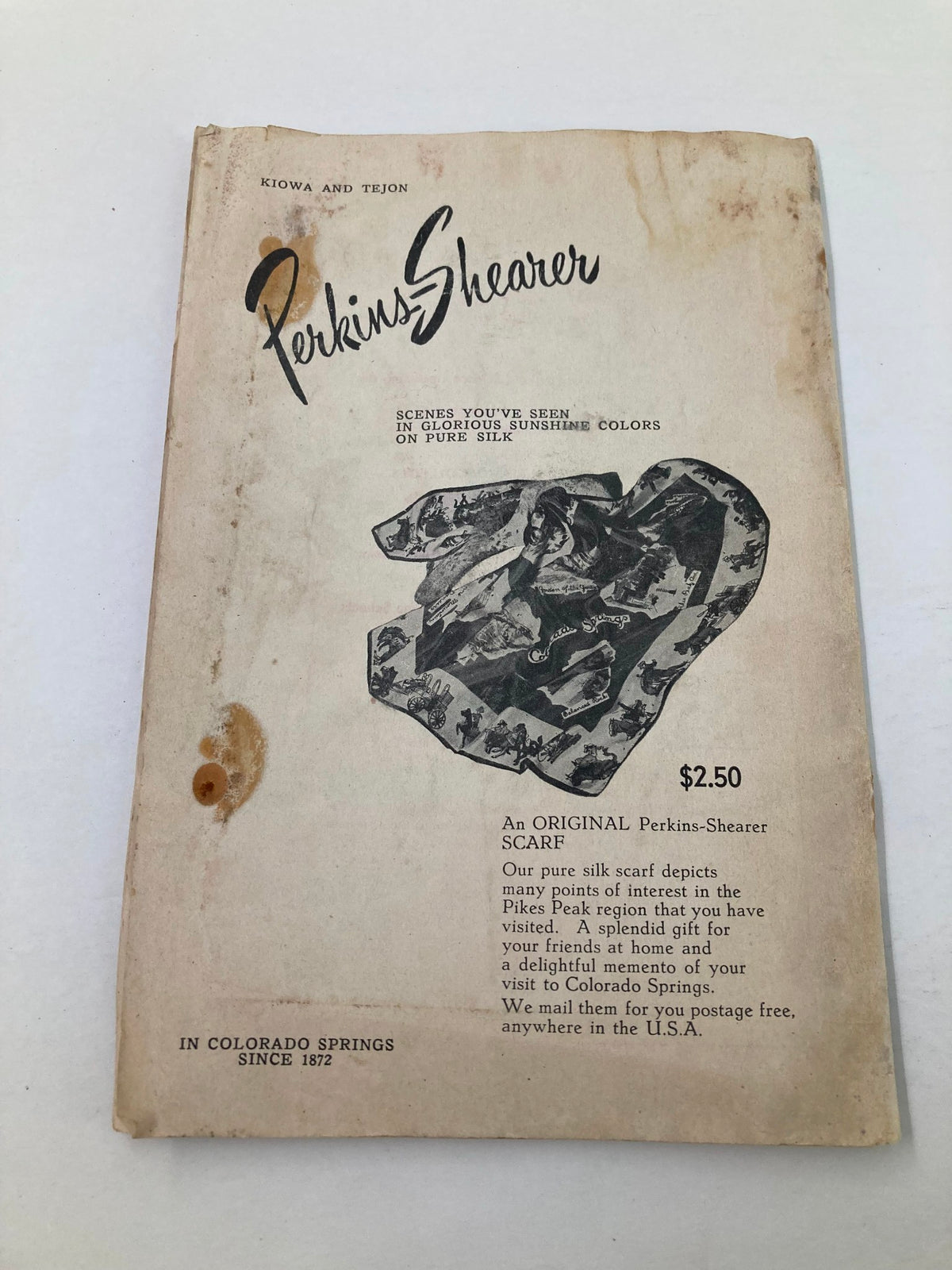 Cover of the original Perkins-Shearer scarf advertisement featured in the Pikes Peak or Burst Magazine July 2, 1951, promoting silk scarves depicting Colorado scenes.