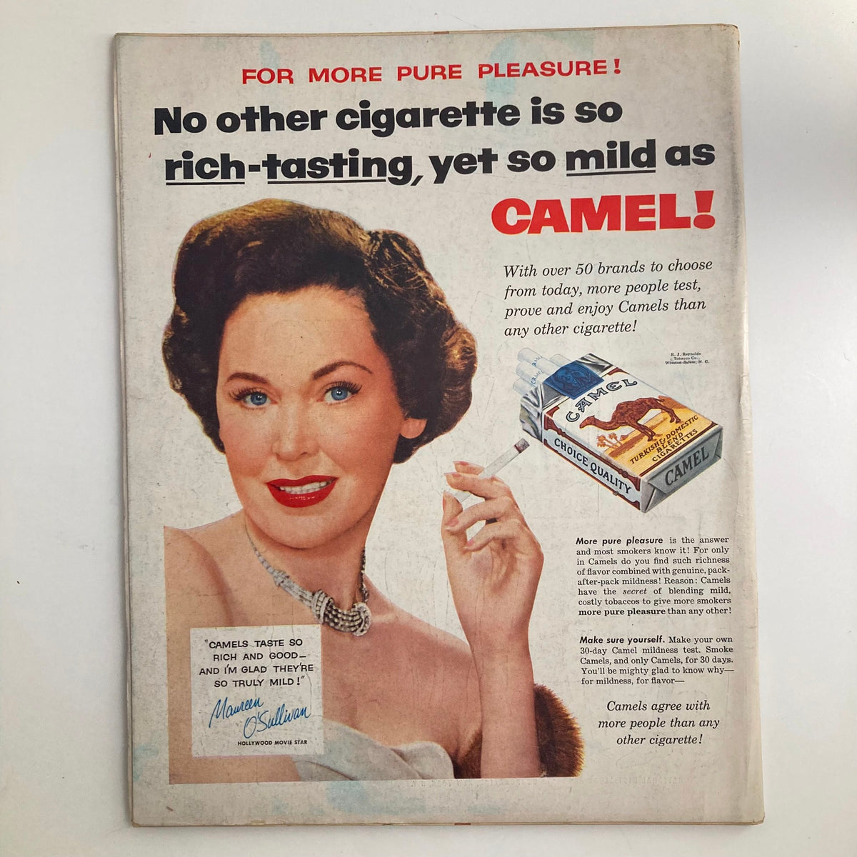 Vintage advertisement from VTG Look Magazine November 16 1954 Vol 18 No. 23 promoting Camel cigarettes with a classic glamorous model.