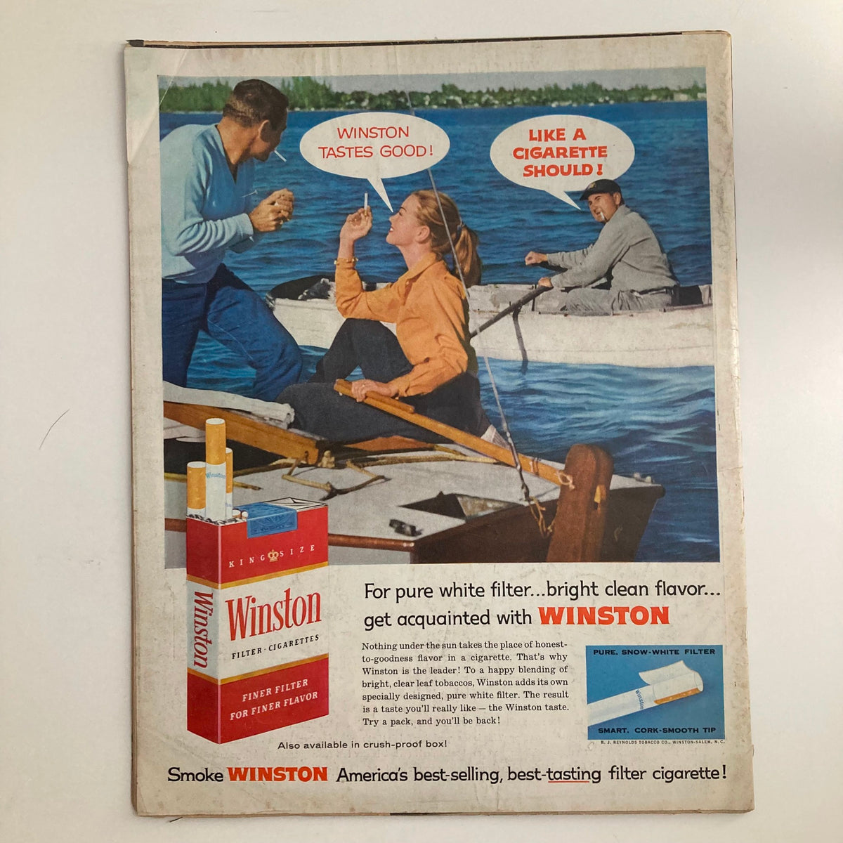 Advertisement from VTG Look Magazine July 22, 1958 showcasing Winston cigarettes, featuring three individuals in a boating scene with playful dialogue about the product.