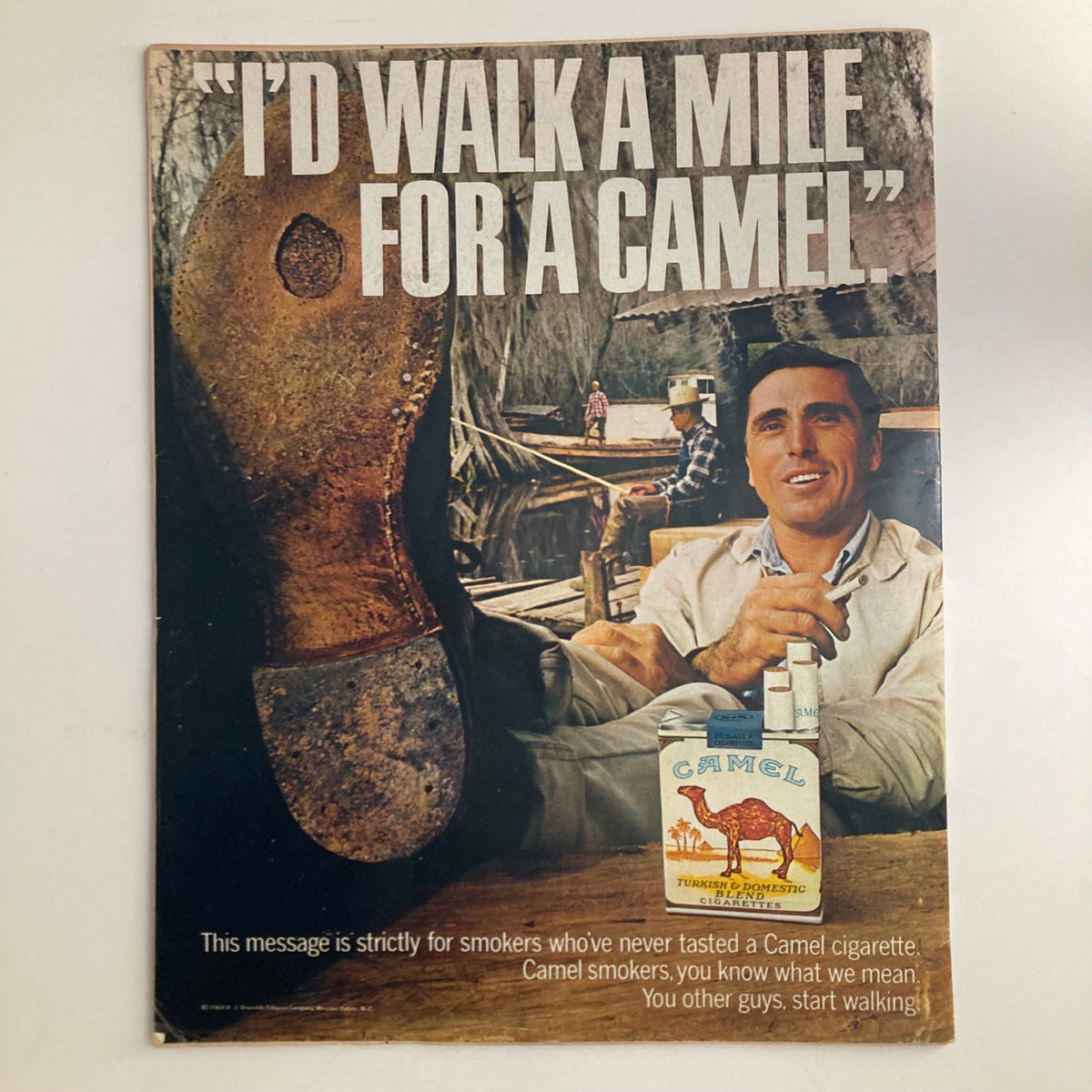 Advertisement page from VTG Look Magazine July 23, 1968, featuring a Camel cigarette ad that reflects marketing trends of the era.