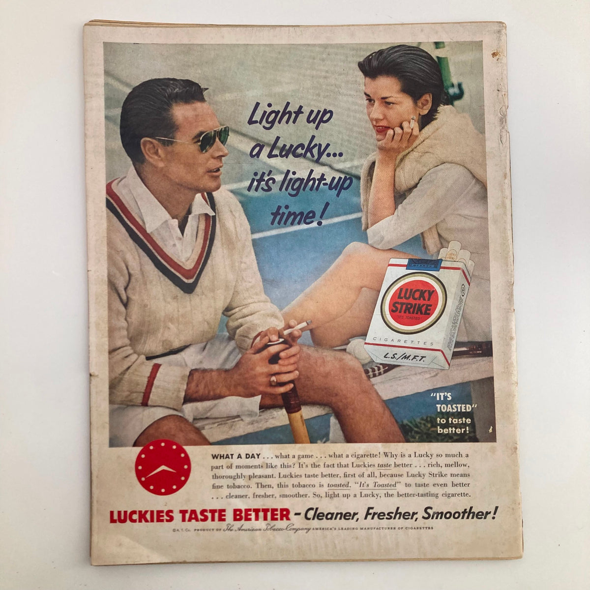 Back cover of the VTG Look Magazine May 17, 1955 featuring a vintage advertisement for Lucky Strike cigarettes with a stylish couple.
