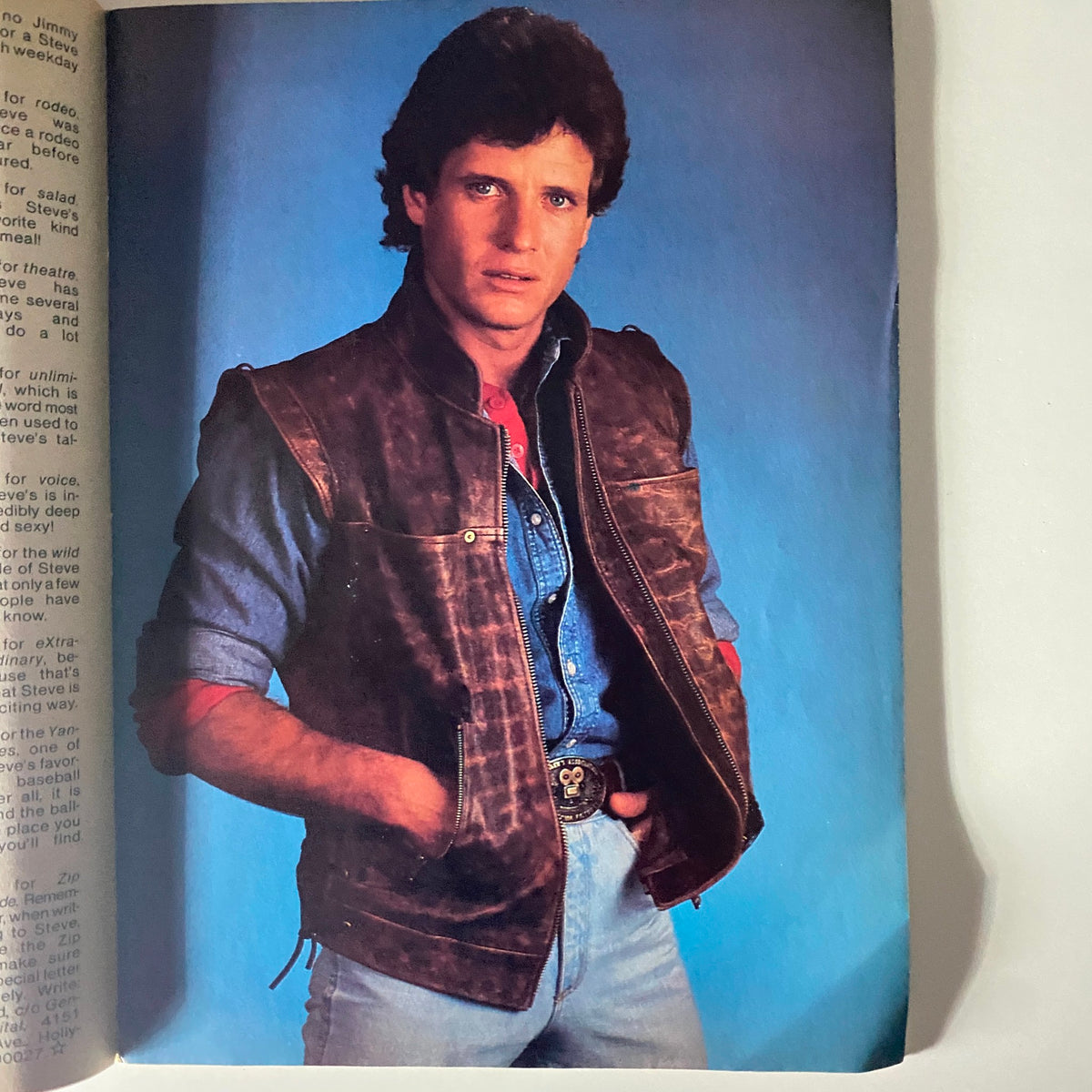 An interior page from Teen Beat Magazine August 1983, featuring a striking photograph of a male celebrity dressed in a leather vest, part of an article about Steve Bond, contributing to 1980s pop culture.