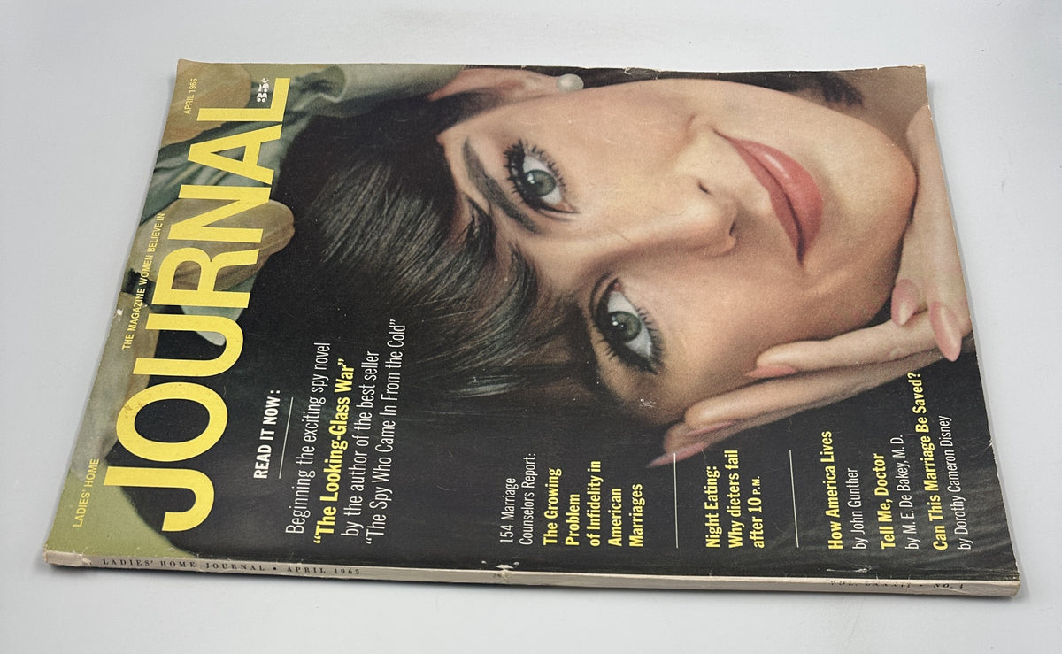 Cover view of Ladies' Home Journal Magazine April 1965, showcasing the featured articles including The Looking-Glass War and insights on American marriages.