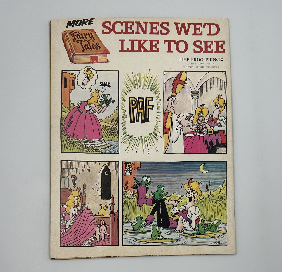 Cover of another comic titled 'More Scenes We’d Like to See: The Frog Prince,' showcasing a humorous comic strip format. This image is distinct and unrelated to MAD Magazine but presents a playful illustration style.