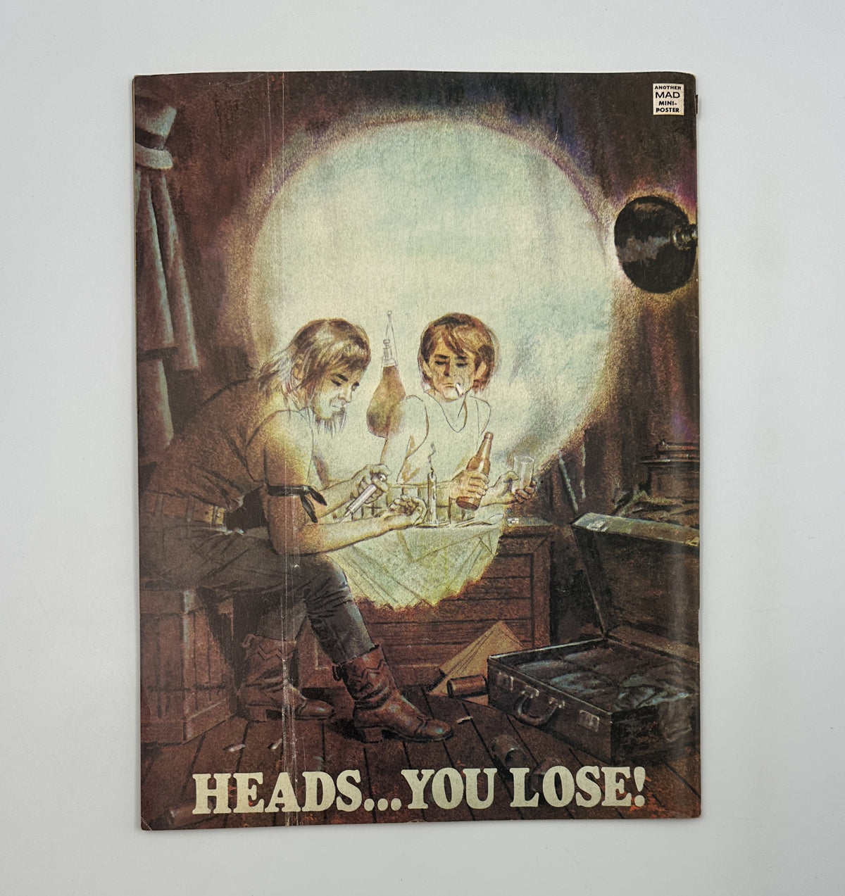 MAD Magazine No. 165 March 1974 featuring an illustration with two characters playing a game in a dimly lit room, representing the comedic and satirical style of the magazine.