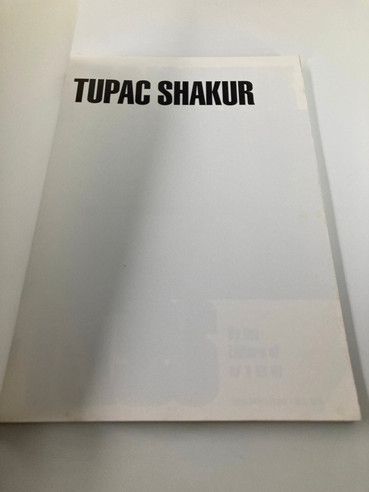 Back cover of The New York Times Best Seller Memoir of Tupac Shakur 1971 - 1996, featuring the text 'TUPAC SHAKUR'.