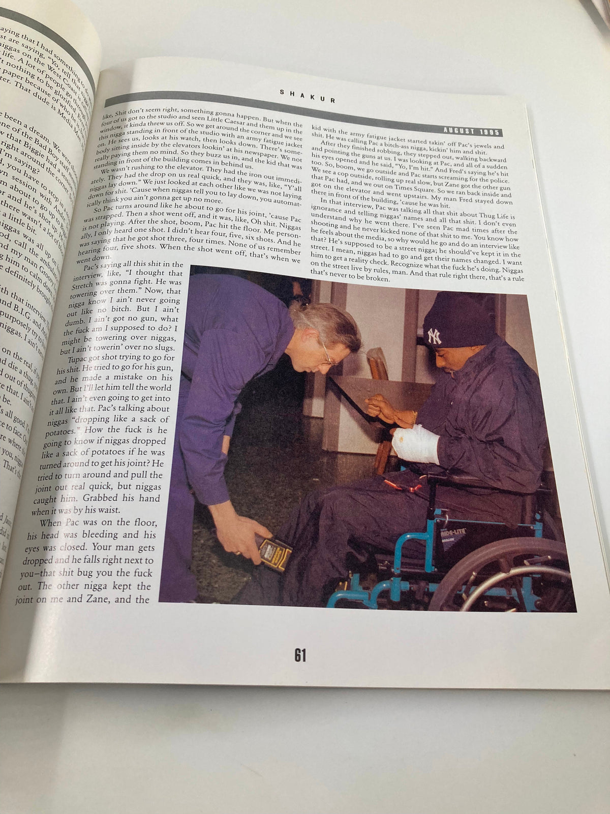 Tupac Shakur Memoir - A pivotal moment of Tupac in a wheelchair being assisted by a doctor, depicting his resilience and struggles.