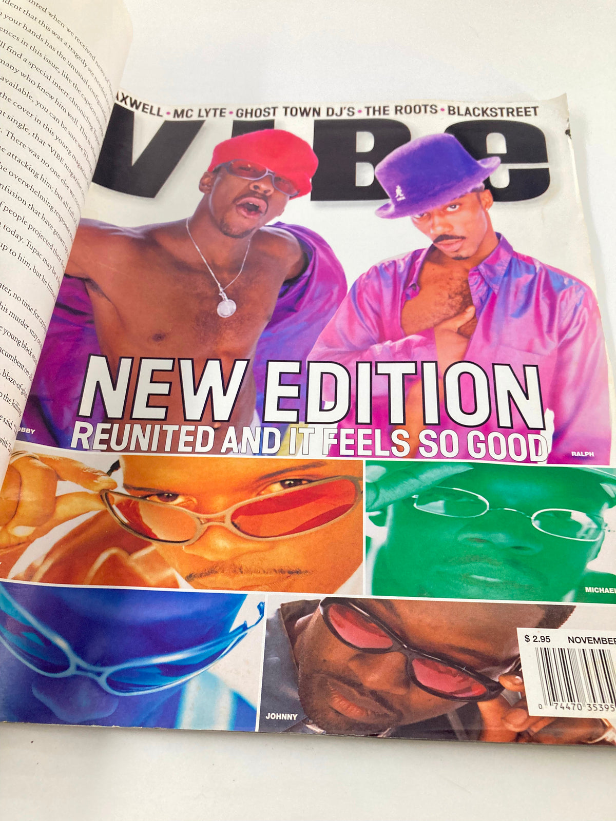 Inside spread of Vibe Magazine November 1996 highlighting an article on New Edition, featuring vibrant colors and stylish fashion, showcasing the group's reunion.