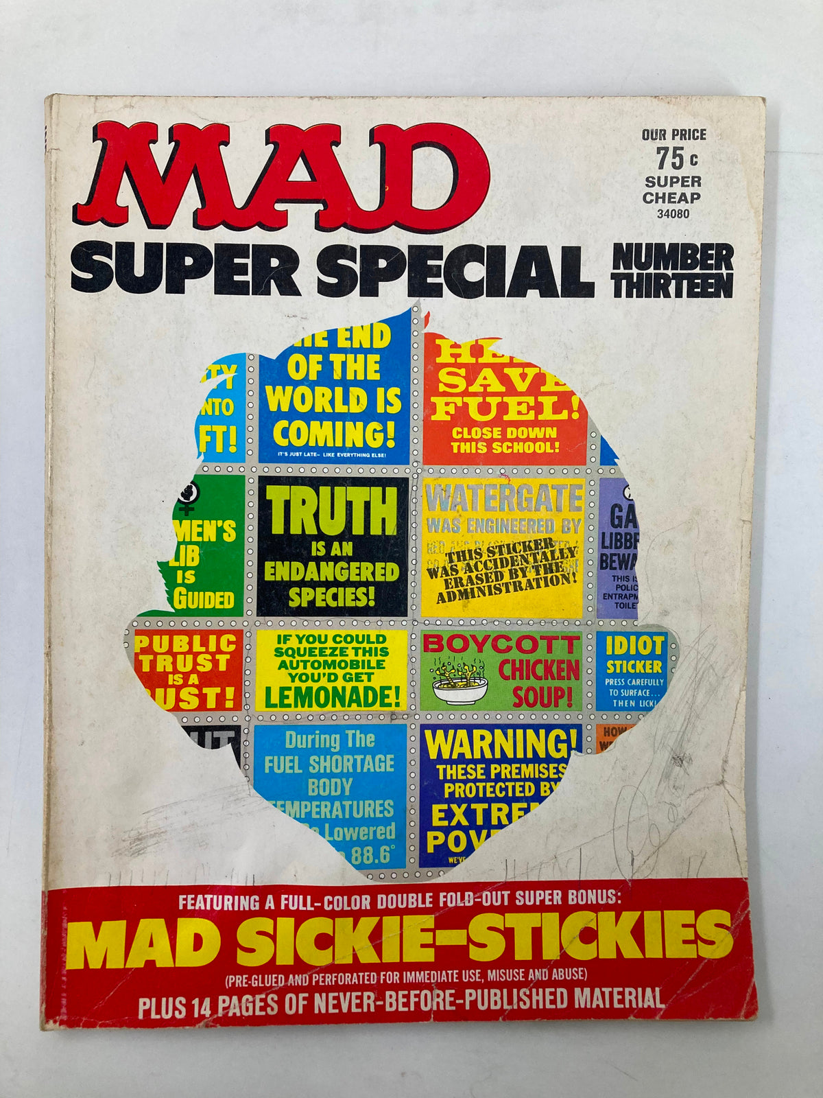 Cover of Mad Magazine No. 13 from 1974 featuring the title 'MAD SUPER SPECIAL NUMBER THIRTEEN' and colorful advertisements for Mad Sickie-Stickies.