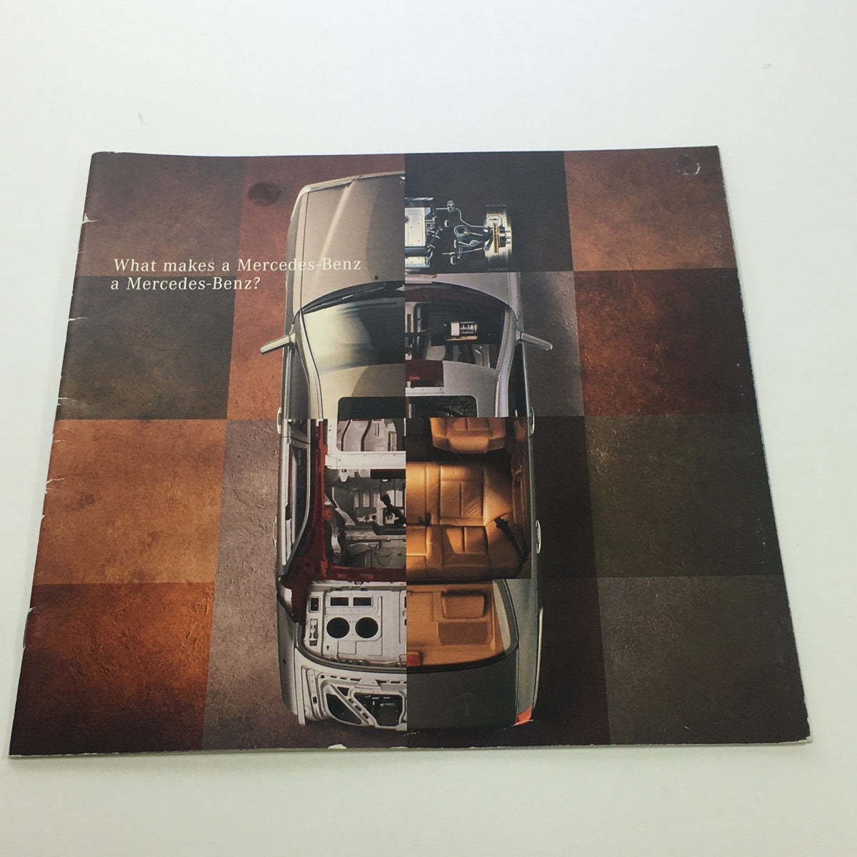 1996 Mercedes-Benz E-Class SL-Class Dealership Car Auto Brochure Catalog cover featuring an artistic overhead view of a Mercedes-Benz interior showcasing its features and craftsmanship.