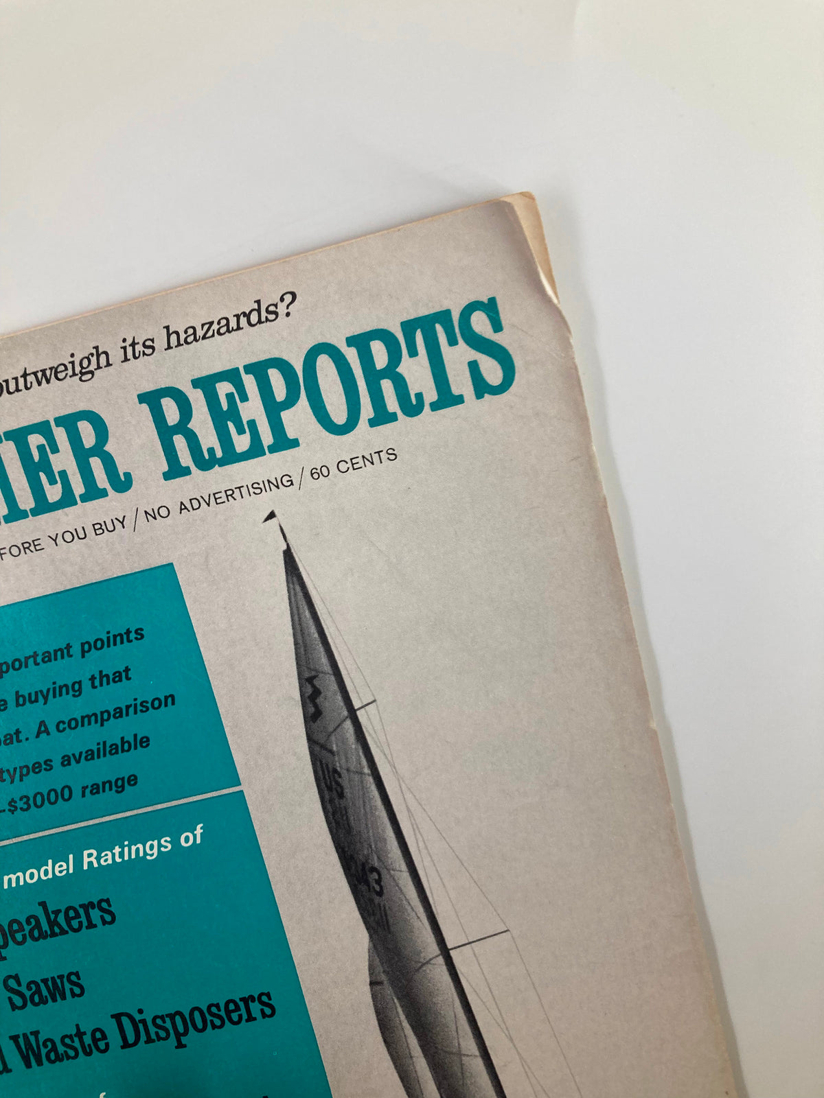 Close-up view of the May 1970 Consumer Reports Magazine title showcasing details on sailboats and product ratings for loudspeakers and food waste disposers.