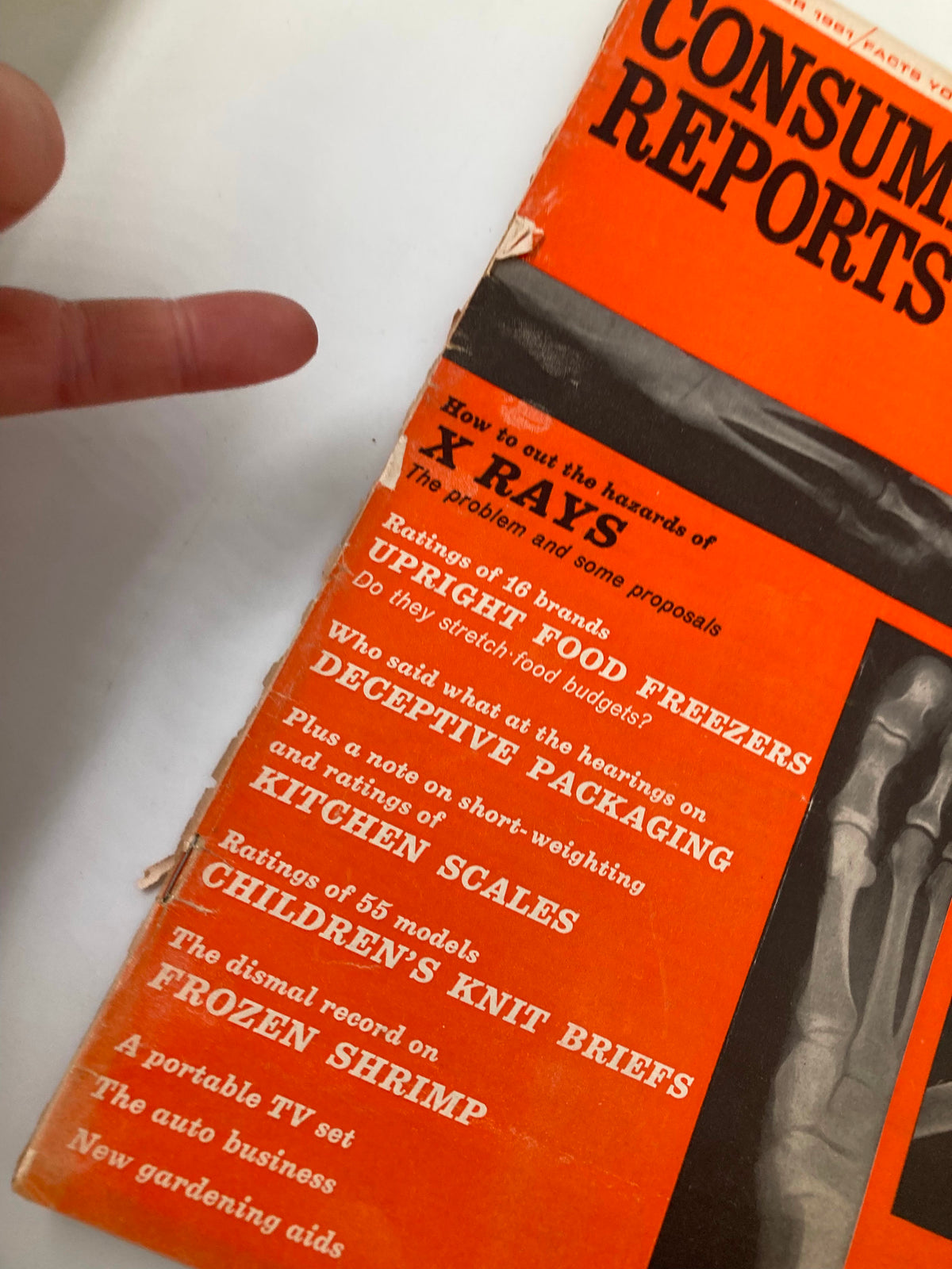 Close-up of the cover of VTG Consumer Reports Magazine September 1961, highlighting the title 'How To Cut The Hazards of X-Rays' and other featured topics.
