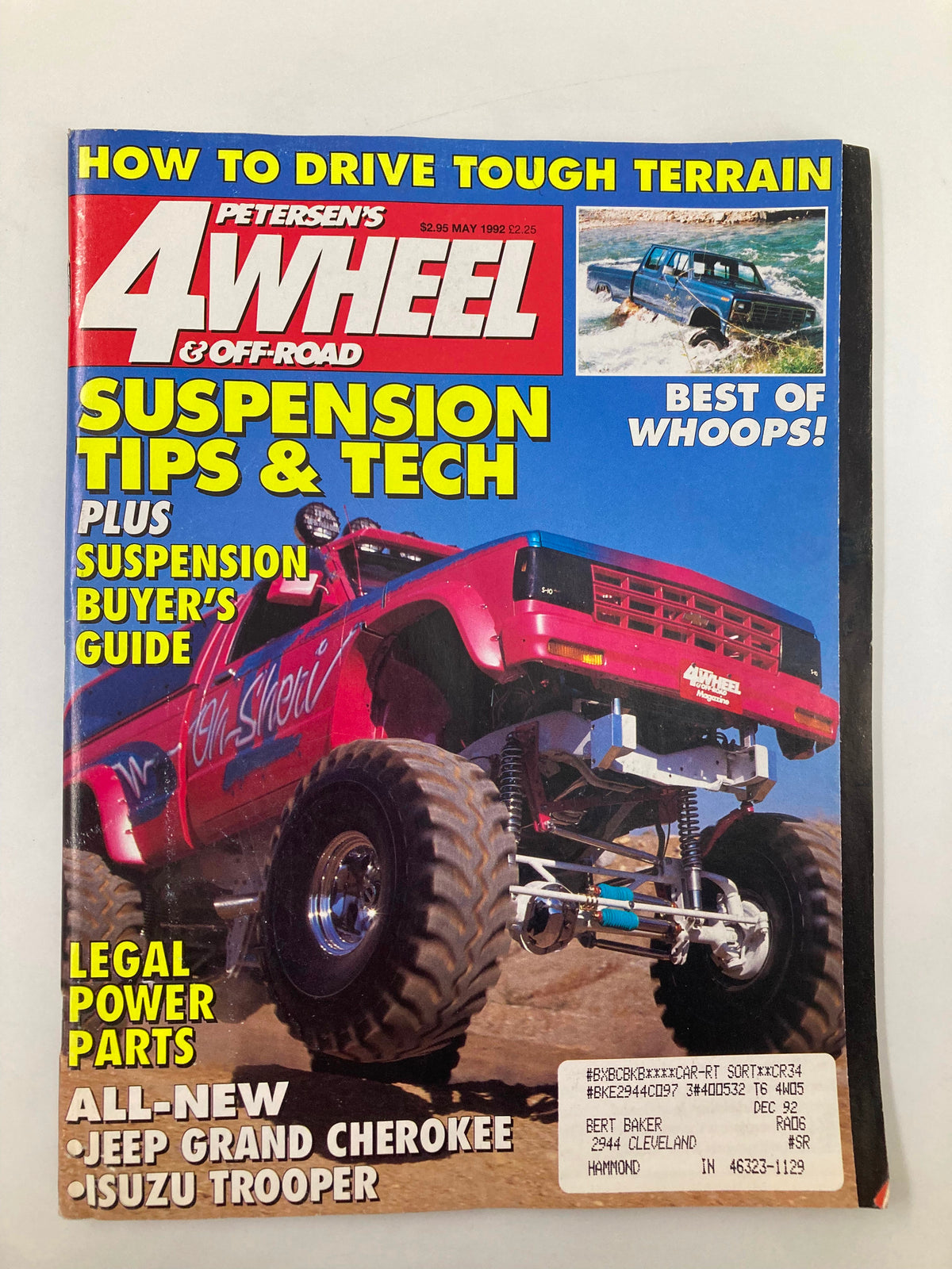 Cover of Petersen's 4 Wheel & Off-Road Magazine from May 1992 featuring 'Suspension Tips & Tech' and a vibrant off-road vehicle. The magazine highlights suspension technology and includes a buyer's guide, appealing to automotive enthusiasts and collectors.