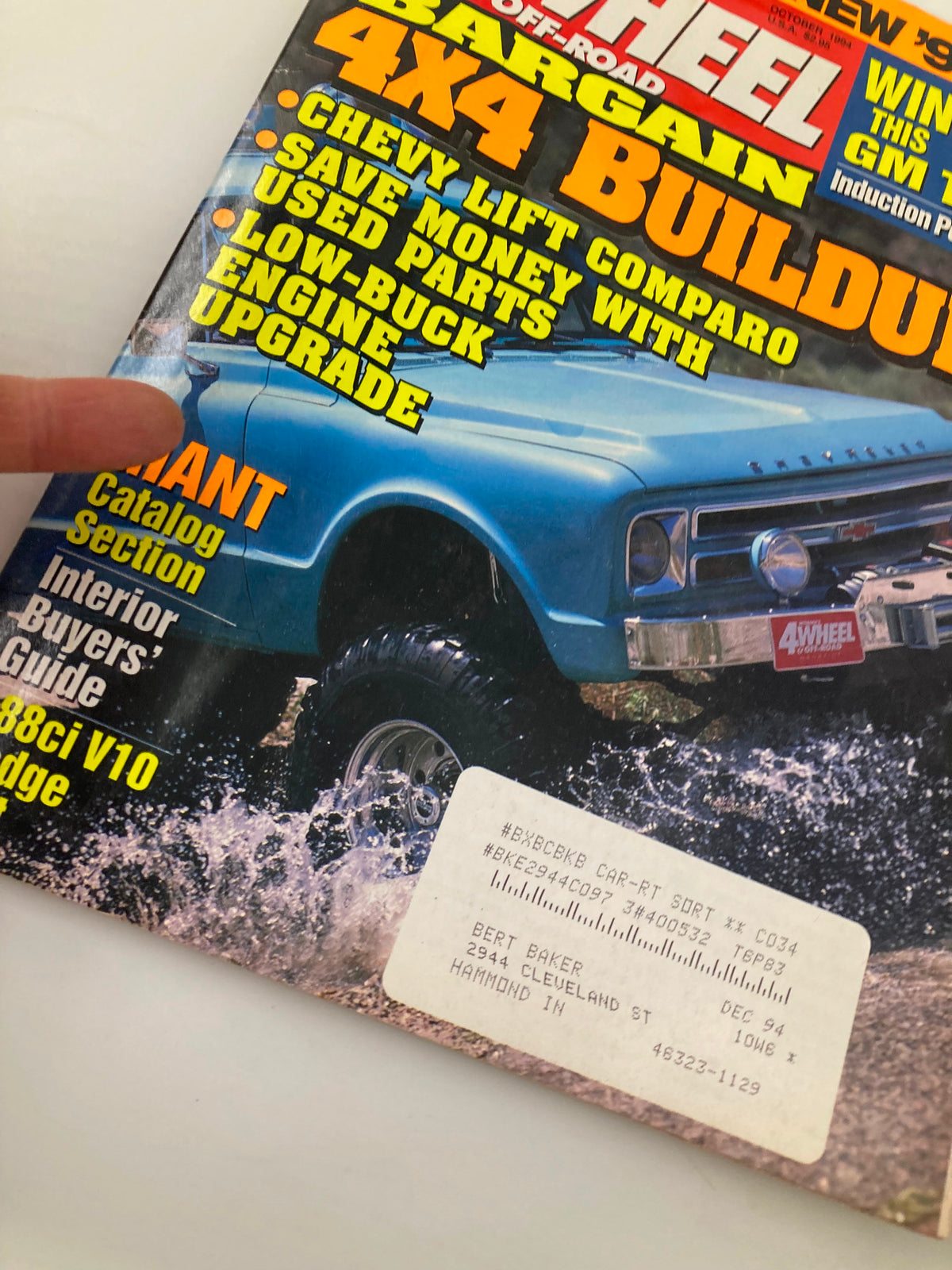 Close-up of Petersen's 4 Wheel & Off-Road Magazine October 1994 cover highlighting 'Bargain 4x4 Buildups,' focusing on a blue vehicle and promotional content.