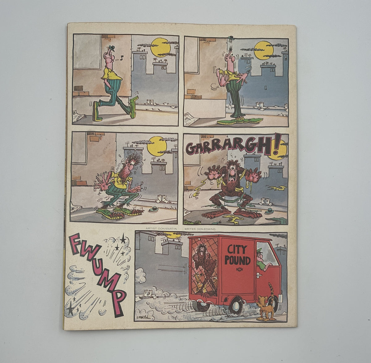 Back cover of MAD Magazine No. 207, June 1979, showcasing a comic strip with humorous visuals and dialogues. Reflects the satirical nature and comedic storytelling typical of MAD Magazine.