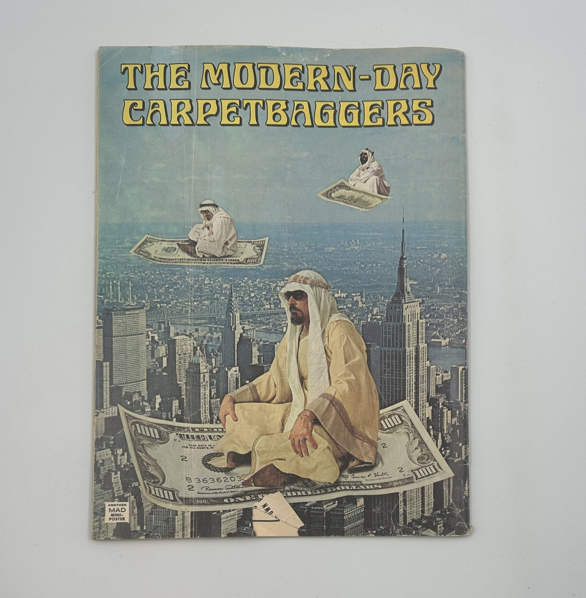 Cover of MAD Magazine No. 177 from September 1975, featuring a satirical illustration titled 'The Modern-Day Carpetbaggers' with caricatures of figures sitting on large dollar bills over an urban skyline backdrop.