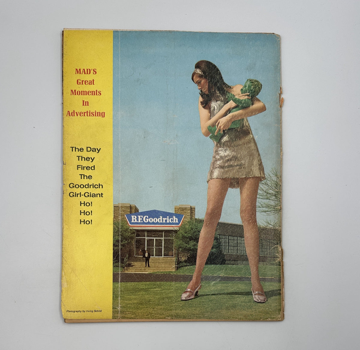 Cover of MAD Magazine No. 122 October 1968 featuring 'MAD's Great Moments In Advertising' with an illustration of a giant woman holding a small child, along with an ad for B.F. Goodrich.