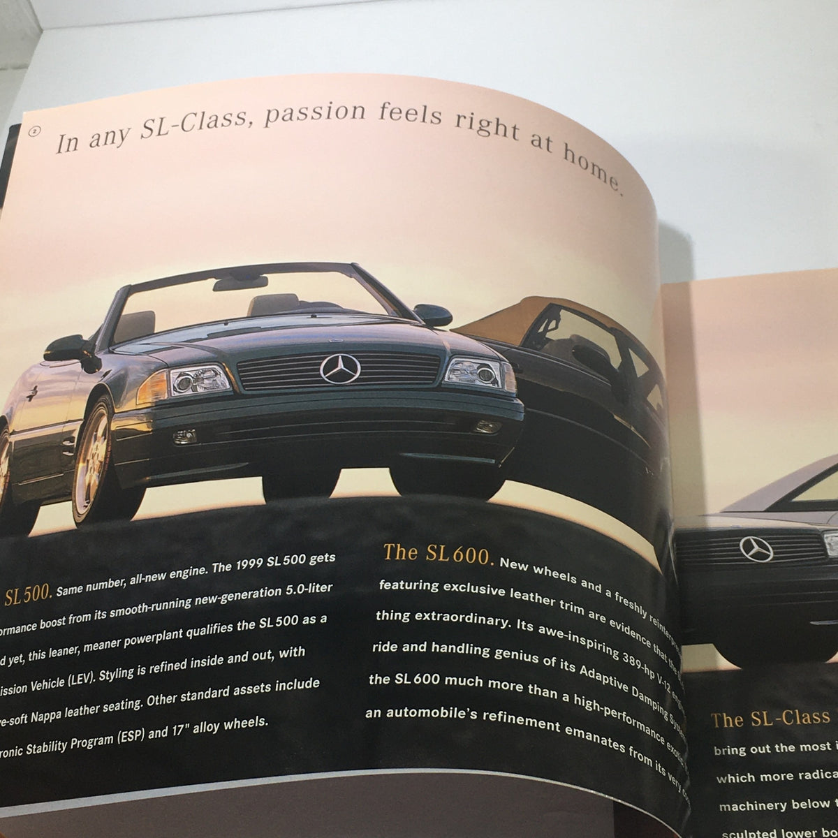 Another interior image from the 1999 Mercedes-Benz SL-Class brochure, emphasizing the luxury and performance aspects of the SL-Class models.