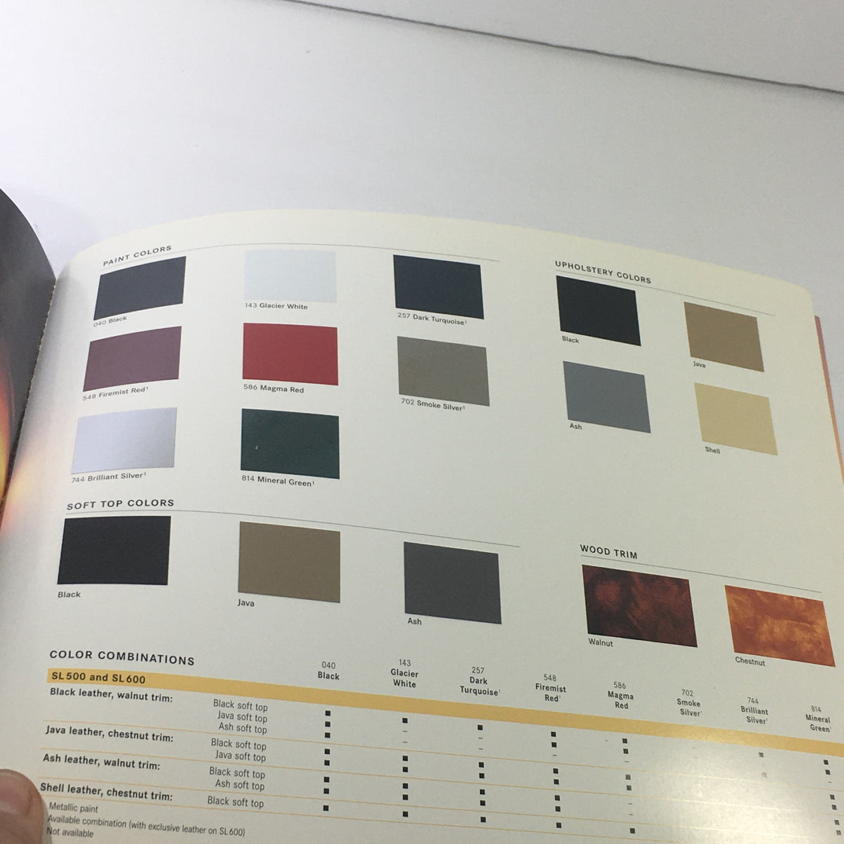 Color palette page from the 1999 Mercedes-Benz SL-Class Sport Package Dealership Car Auto Brochure Catalog, featuring options for paint colors, upholstery, soft top colors, and wood trim.