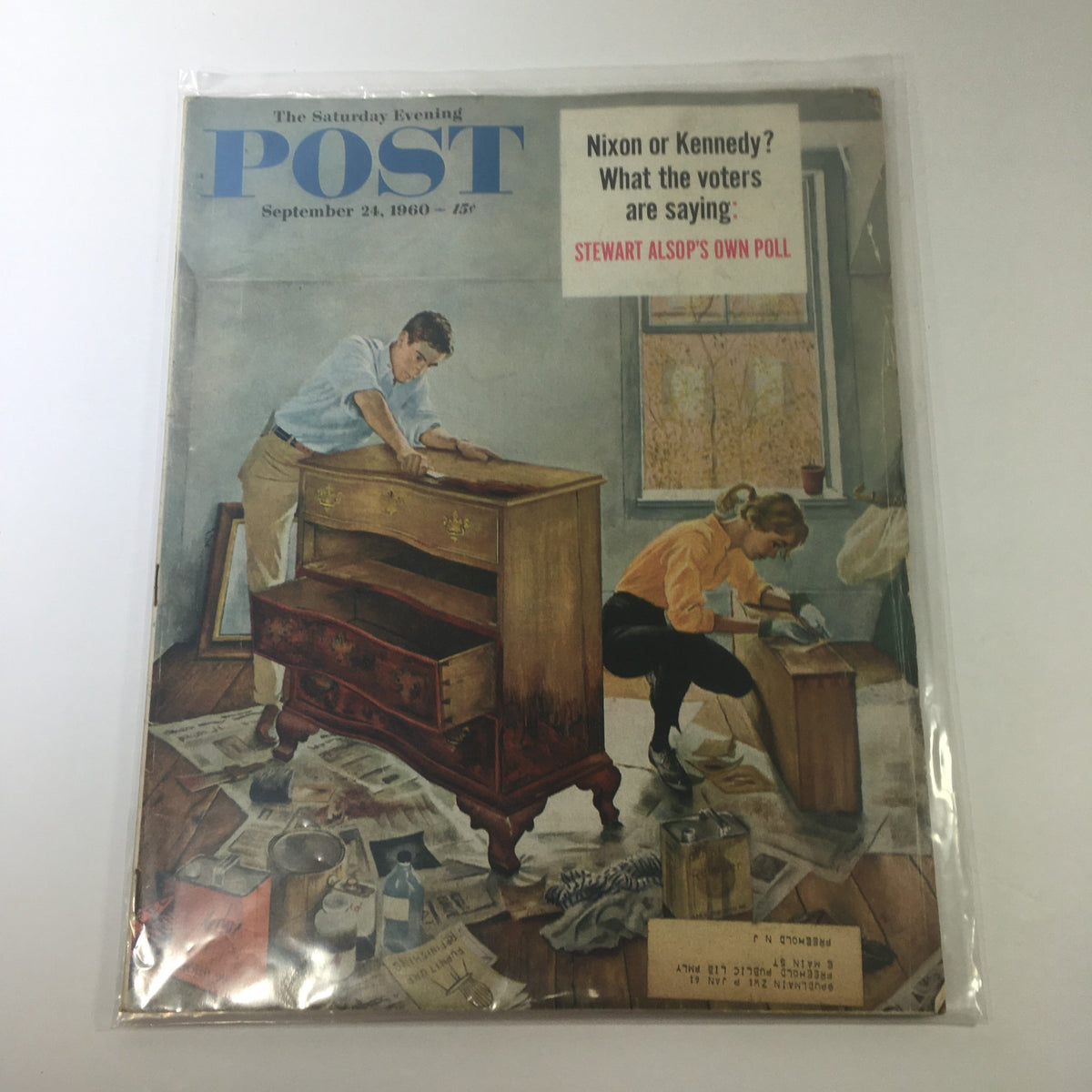 Cover image of The Saturday Evening Post Magazine, September 24, 1960, featuring a scene of a man and woman working on furniture restoration, with the headline 'Nixon or Kennedy? What the voters are saying; Stewart Alsop's own poll.'