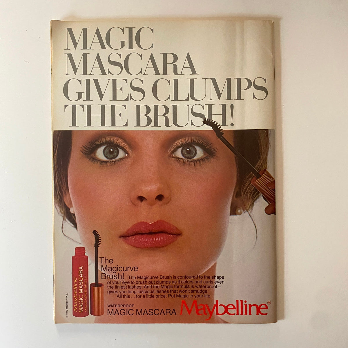 Teen Beat Magazine June 1983 advertisement for Magic Mascara by Maybelline featuring a model with striking makeup. Highlights the product's benefits while resonating with beauty enthusiasts of the era.