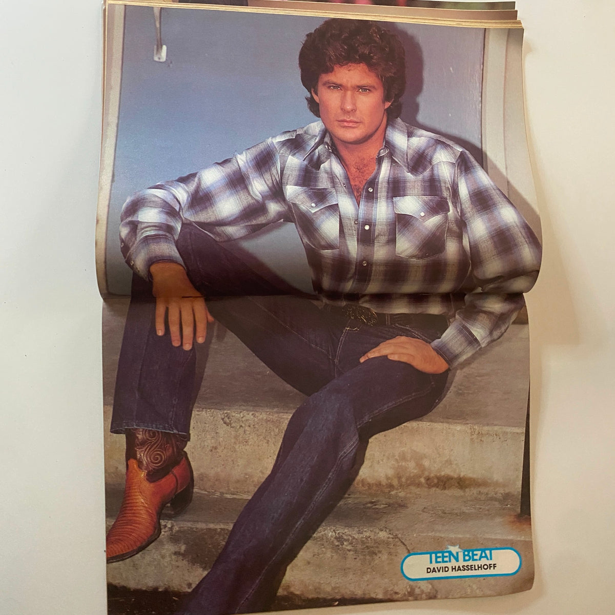 Teen Beat Magazine July 1983 highlighting a man in a plaid shirt seated confidently, reflecting the style and trends of '80s celebrity culture.
